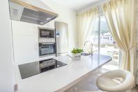 Kuchyň nebo kuchyňský kout v ubytování Cubo's Apartamento Boutique Alhaurin