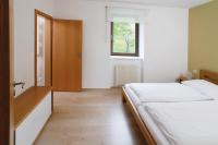 Postel nebo postele na pokoji v ubytování Apartmán Stará škola
