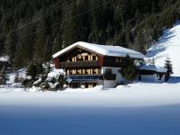 Almblick Appartements during the winter