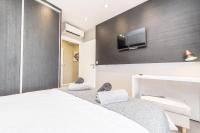 Televízia a/alebo spoločenská miestnosť v ubytovaní Luxury Apartments Garden