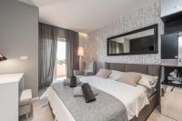 Posteľ alebo postele v izbe v ubytovaní Luxury Apartments Garden