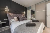 Posteľ alebo postele v izbe v ubytovaní Luxury Apartments Garden