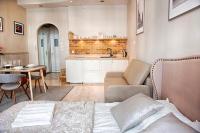 Posedenie v ubytovaní Apartament Kopernika 25