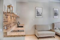 Posedenie v ubytovaní Apartament Kopernika 25