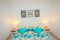 Posteľ alebo postele v izbe v ubytovaní Family Beach Apartments