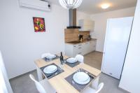 Kuchyňa alebo kuchynka v ubytovaní Family Beach Apartments