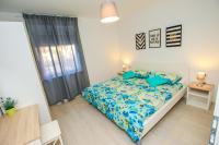 Posteľ alebo postele v izbe v ubytovaní Family Beach Apartments