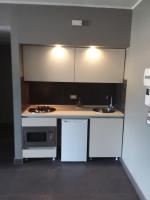 A kitchen or kitchenette at Uniclub House