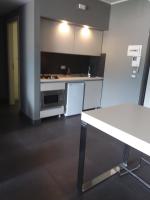 A kitchen or kitchenette at Uniclub House