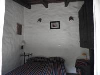 Posteľ alebo postele v izbe v ubytovaní Casa Torre Antigua