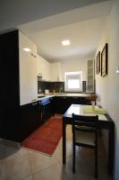 Kuchyňa alebo kuchynka v ubytovaní Apartman Viktoria