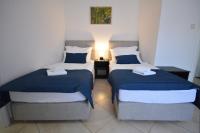 Posteľ alebo postele v izbe v ubytovaní Apartman Viktoria