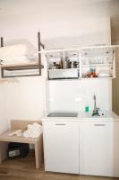 Kuchyň nebo kuchyňský kout v ubytování Coral Boutique Apartments