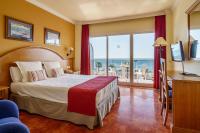 Postel nebo postele na pokoji v ubytování Hotel Isabel