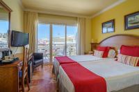 Postel nebo postele na pokoji v ubytování Hotel Isabel