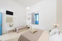 Posteľ alebo postele v izbe v ubytovaní Captain's House Hotel Suites & Apartments
