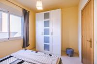 A bed or beds in a room at Casa Neus Barà