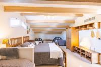 A bed or beds in a room at Casa Neus Barà