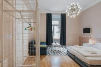 Łóżko lub łóżka w pokoju w obiekcie Apartments Downtown