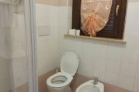 Koupelna v ubytování Casale di Burano