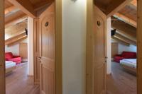 Łóżko lub łóżka w pokoju w obiekcie Agritur Maso Chemela