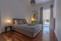 Posteľ alebo postele v izbe v ubytovaní Athenian Apartment