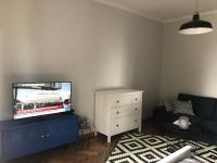 Televízia a/alebo spoločenská miestnosť v ubytovaní Loft Studio
