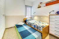 Posteľ alebo postele v izbe v ubytovaní Vivalidays Es Blau - Blanes - Costa Brava