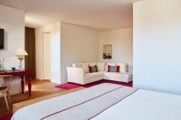 Hotel Neri – Relais & Chateauxにあるベッド