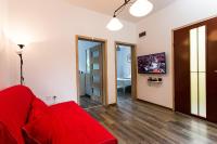 TV a/nebo společenská místnost v ubytování Top center big family apartment with garden view