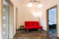 Posezení v ubytování Top center big family apartment with garden view