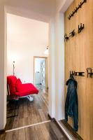 Posezení v ubytování Top center big family apartment with garden view