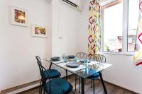 Posezení v ubytování Top center big family apartment with garden view