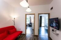 TV a/nebo společenská místnost v ubytování Top center big family apartment with garden view
