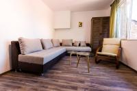 Posezení v ubytování Top center big family apartment with garden view