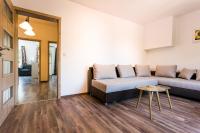Posezení v ubytování Top center big family apartment with garden view