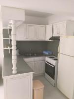 A kitchen or kitchenette at Namare Luxury Apartments