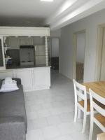 A kitchen or kitchenette at Namare Luxury Apartments