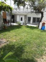 A garden outside Namare Luxury Apartments