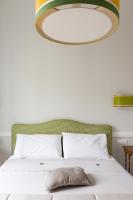 A bed or beds in a room at Guest House Poerio88