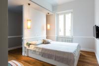 A bed or beds in a room at Guest House Poerio88