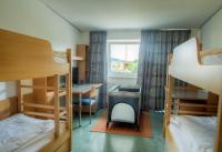 Posteľ alebo postele v izbe v ubytovaní Kolpinghaus Salzburg - SommerHOSTEL
