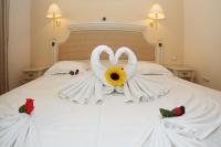 Postel nebo postele na pokoji v ubytování Duni Marina Beach Hotel - All Inclusive