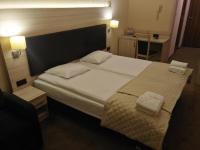 Łóżko lub łóżka w pokoju w obiekcie Spa Hotel Gloria