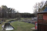 a view of a river from a house at Pension &amp; Gasthaus Kattenstieg in Kattenstiegs-Mühle