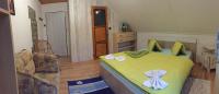A bed or beds in a room at Privat Greta