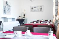 A seating area at Pension & Restaurant La Amalia