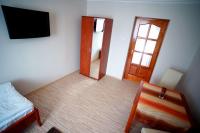 Łóżko lub łóżka w pokoju w obiekcie Borka Apartman