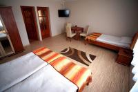 Łóżko lub łóżka w pokoju w obiekcie Borka Apartman
