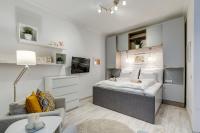 Posteľ alebo postele v izbe v ubytovaní Riverside Deluxe Apartment